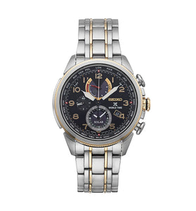 Seiko men's wristwatch with dark dial, gold accents, metal bracelet