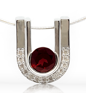 Romanic pendent featuring round garnet and CZ stones