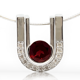 Romanic pendent featuring round garnet and CZ stones