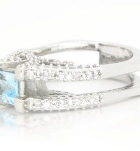 Sophisticated princess cut blue topaz V ring with sterling silver