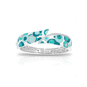 Sterling silver bangle with turquoise enamel geometric pattern and engraved sides