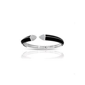 Sterling silver bangle with black enamel band and pyramid-like bezel accents