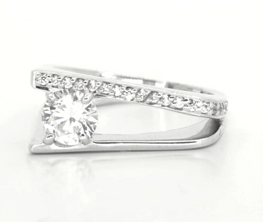 white topaz featured in a slip shank band of sterling silver