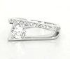 white topaz featured in a slip shank band of sterling silver