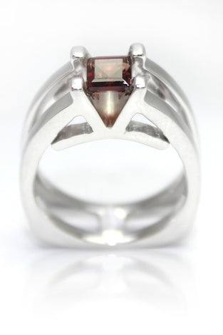 Sterling silver statement ring with princess cut garnet