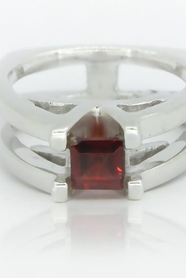 Sterling silver statement ring with princess cut garnet