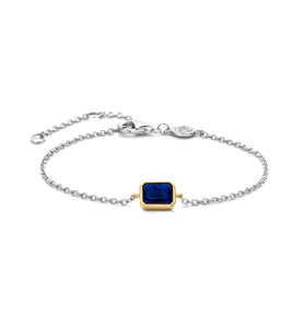 Sterling silver bracelet with blue square bezel charm and round clasp