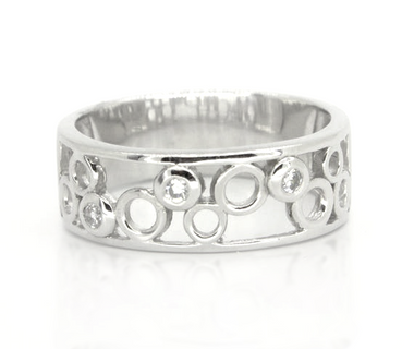 Sterling silver bubble ring with circular cutout design and clear gemstone accents