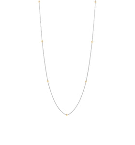 Sterling silver station chain necklace with small yellow-gold plated bead links