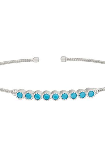 Sterling silver cuff bracelet with turquoise bead row and round end caps