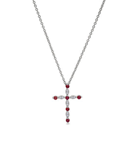 Sterling silver cross pendant with red garnet stones, on a silver chain