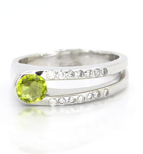 Sterling silver ring with a round peridot and white topaz