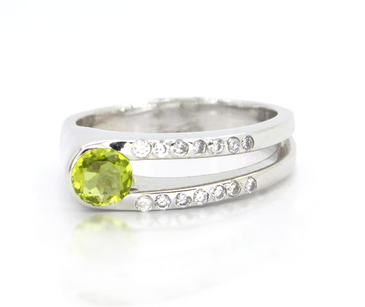 Sterling silver ring with a round peridot and white topaz