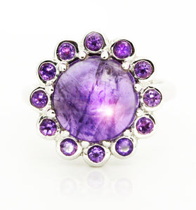 Sterling silver ring with a bezel setting amethyst stones