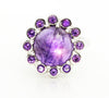 Sterling silver ring with round amethyst cabochon and purple halo stones