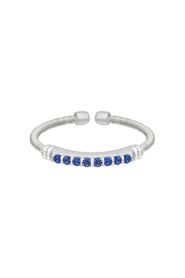 Sterling silver cuff ring with blue sapphire row stones