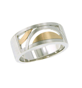 Sterling silver carved into geometrical shapes with gold accents. 