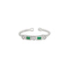 Sterling silver cuff ring with two rectangular green gemstone settings and pavé detail