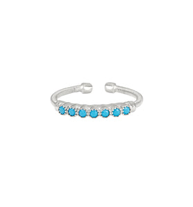 Sterling silver cuff ring with turquoise bezel stones