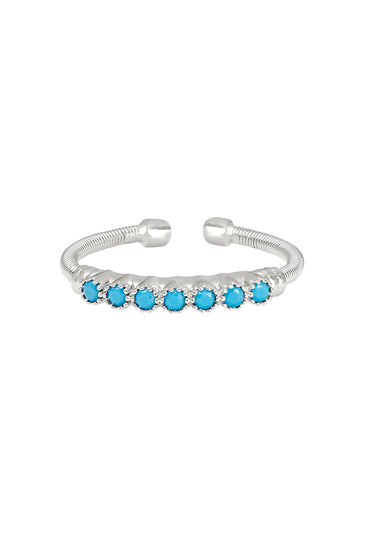 Sterling silver cuff ring with turquoise bezel stones