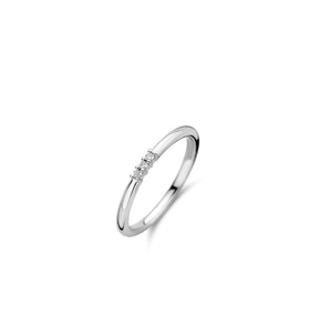 Sterling silver three-stone CZ ring with three small clear stones on a slim band
