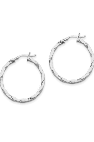 Sterling silver twisted hoop earrings with textured rope-like twist, hinged closure