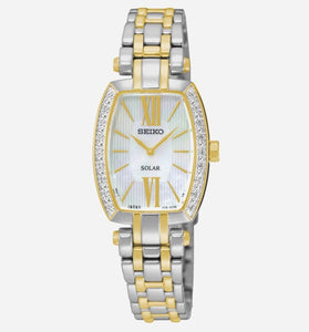 Two-tone women's solar watch with rectangular dial and jeweled bezel