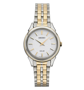 Seiko two-tone women's wrist watch with white dial and gold-tone bezel, metal bracelet.