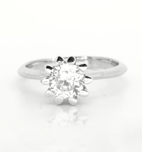 Sparkling white topaz creates a tulip design with sterling silver