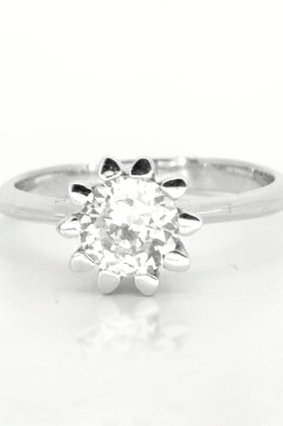 Sparkling white topaz creates a tulip design with sterling silver